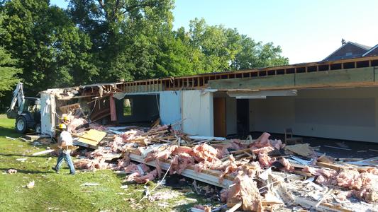 A house that is being demolished and destroyed.