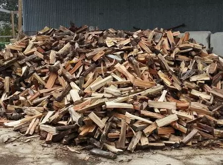 A pile of wood that is stacked on top of each other.